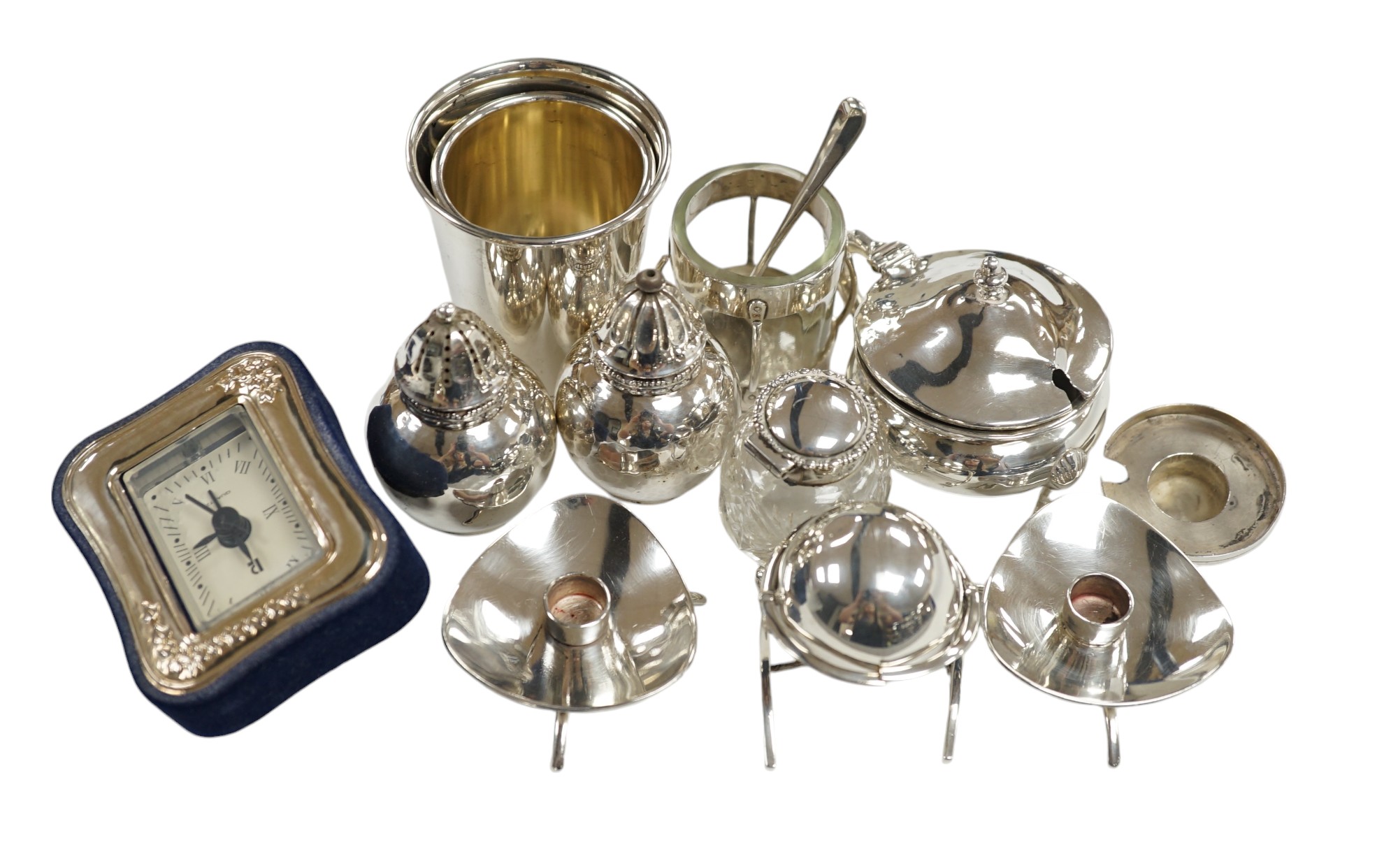 Small silver including an Edwardian miniature silver revolving 'breakfast dish' by Saunders & Shepherd, Birmingham, 1909, height 50mm, four condiments including one modelled as a ship's lamp and two Danish white metal, a